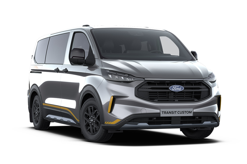 Furgão Ford Transit Custom Trail cinzento-escuro com detalhes em dourado.
