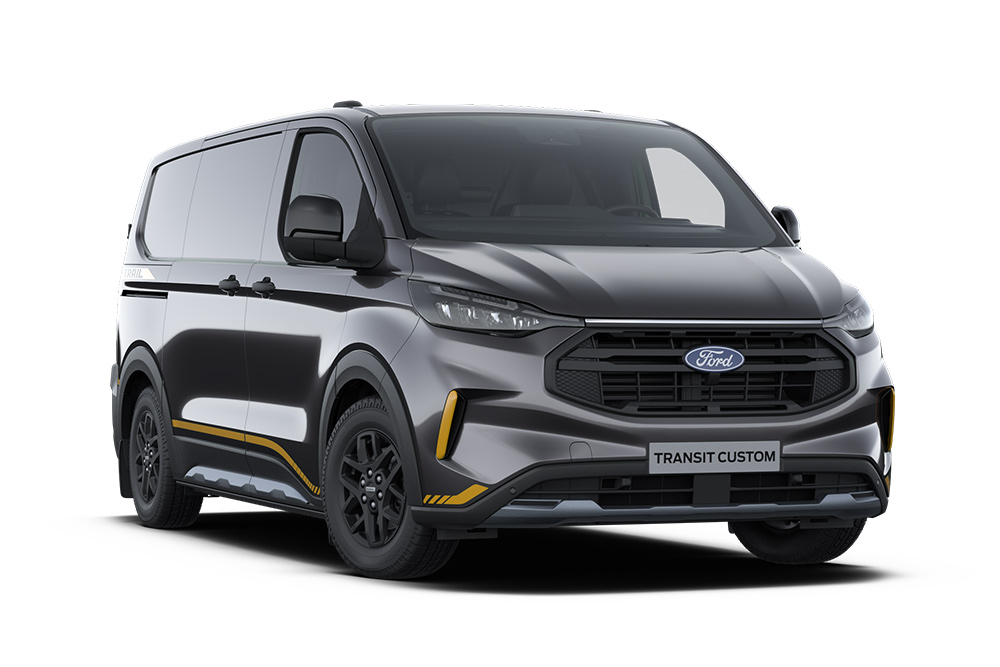 Furgão Ford Transit Custom Trail cinzento-escuro com detalhes em dourado.